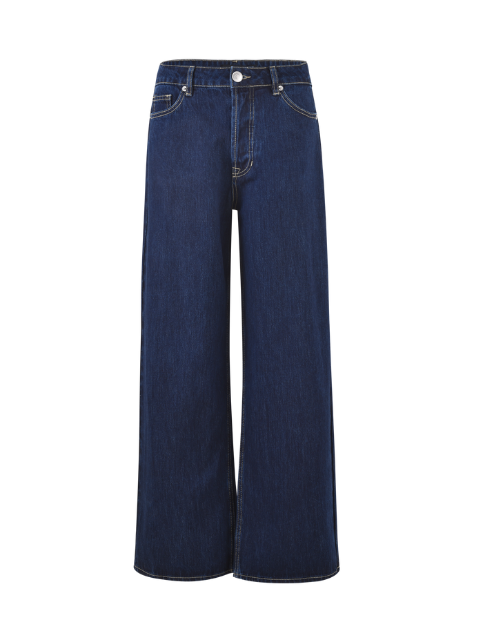 The TIGERMIST FELIX JEAN - DARK DENIM features a high waist, wide-leg silhouette, front and back pockets, button and zip closure, white contrast stitching, and an oversized fit—all shown against a plain background.