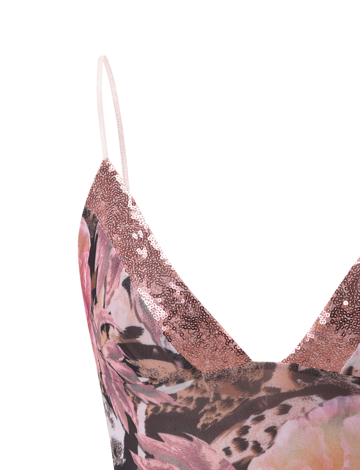 Close-up of the TIGERMIST FENELLA TOP - ANIMALIER FLORAL, featuring thin straps, a pink and brown animal floral print, and a sparkling rose gold sequin trim along the neckline.