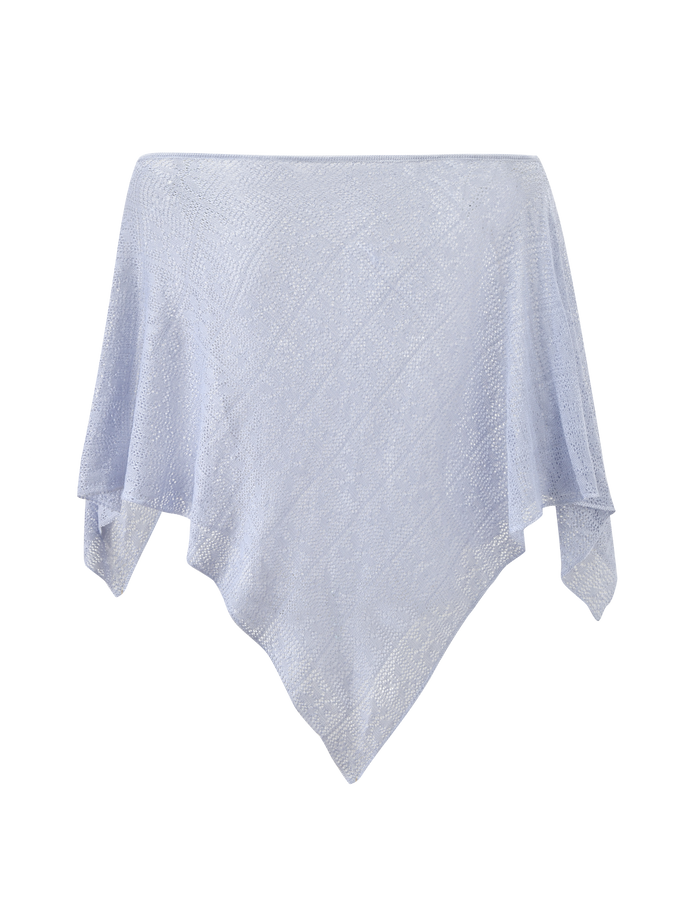 The FERN CROCHET PONCHO in Silver by TIGERMIST features an airy, delicate crochet design with an asymmetrical handkerchief hem and pointed ends, shown on a white background.