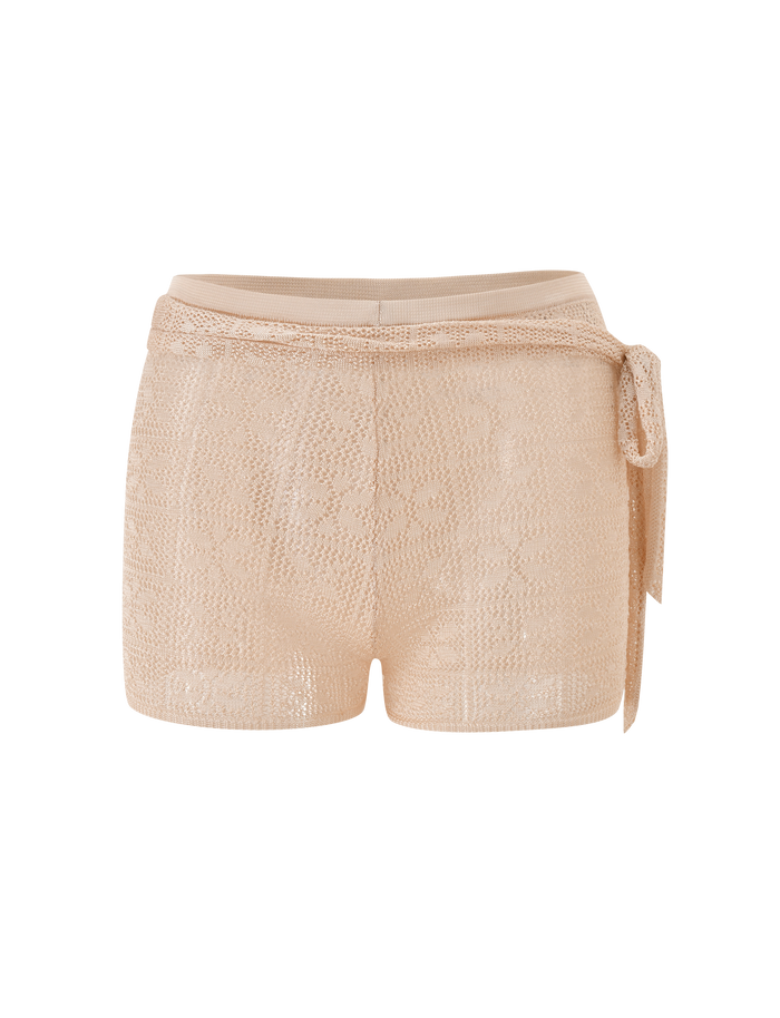 The TIGERMIST FERN CROCHET SHORT in Champagne features a high waist, semi-sheer crochet design, adjustable waistband, and matching fabric tie belt on the right side, shown against a plain white background.