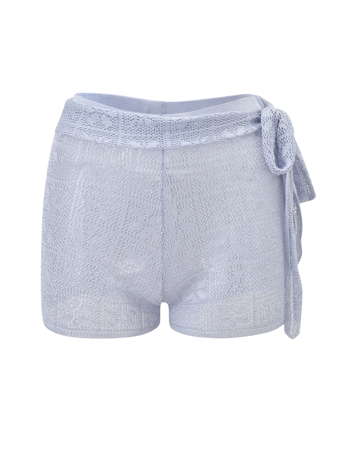 The TIGERMIST FERN CROCHET SHORT in silver features a light blue-silver crochet design, a high waist, and a matching fabric tie belt on the right side, shown against a white background.