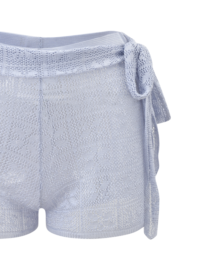 The TIGERMIST FERN CROCHET SHORT in Silver features a textured custom crochet design, adjustable waistband, side tie detail, and lightweight semi-sheer fabric, shown against a white background.