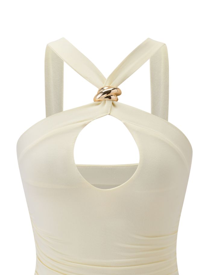 A close-up of the TIGERMIST FINCH TOP in cream, featuring a keyhole cutout chest, two thick straps crossing and gathered at the neckline with twisted gold hardware and silver metallic rings.