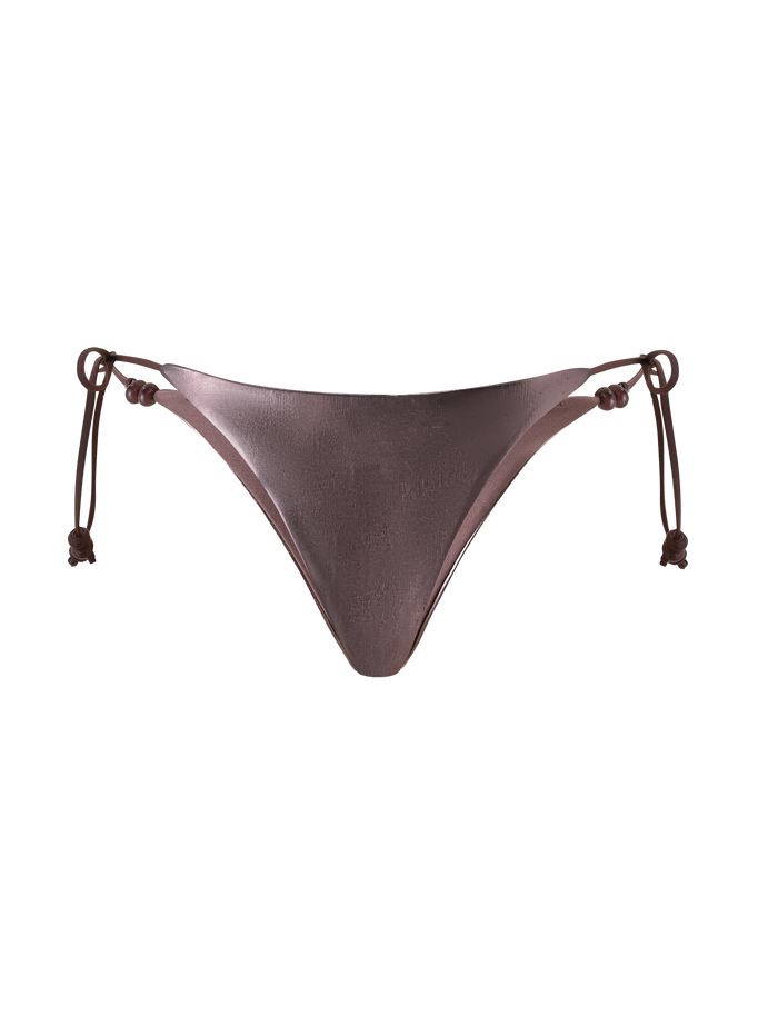 The FINLEA BIKINI BOTTOM by TIGERMIST features a bronze metallic finish with adjustable side ties, shown against a plain white background.