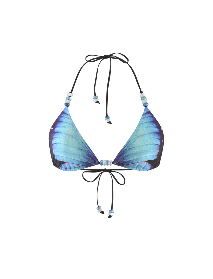 The FINLEA BIKINI TOP - BLACK : BUTTERFLY by TIGERMIST features a blue butterfly wing print, adjustable straps, and small decorative beads.