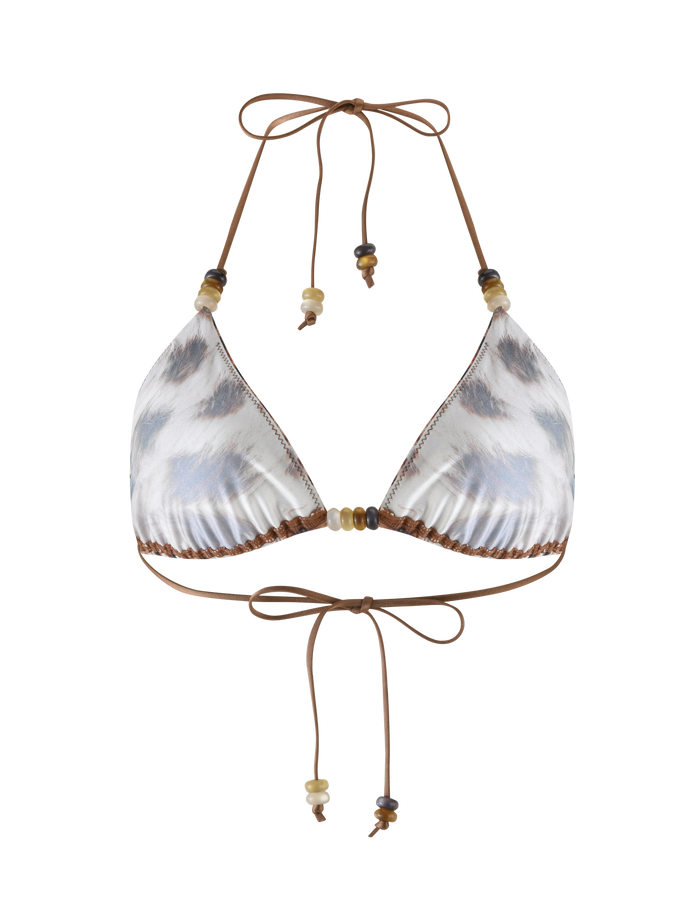 The TIGERMIST FINLEA BIKINI TOP in Leopard Haze features a brown and white leopard print, halter neck with brown ties at the neck and back, and decorative beads on the straps.