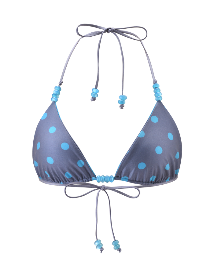 The TIGERMIST FINLEA Reversible Bikini Top features a gray halter neck design with blue polka dots and stripe pattern, accented by blue beads on the neck and front ties, shown against a white background.