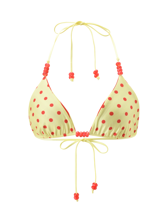 The TIGERMIST FINLEA REVERSIBLE BIKINI TOP - RED YELLOW DOT AND STRIPE features adjustable neck and back ties with decorative red beads on the straps. Shown on a plain white background.