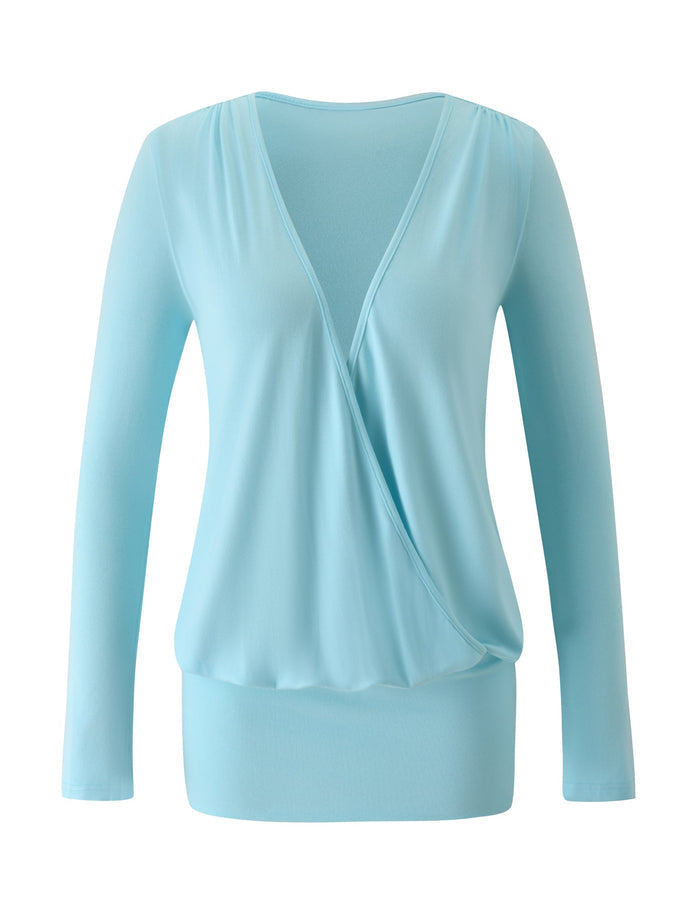 Introducing the FOXLEY MINI DRESS in Aqua Blue by TIGERMIST—a chic mini dress featuring long sleeves, a deep V-neckline, and a wrap-style front inspired by the timeless surplice silhouette. This dress is designed with a fitted waistband and crafted from soft, flowy fabric for an elegant yet comfortable look.