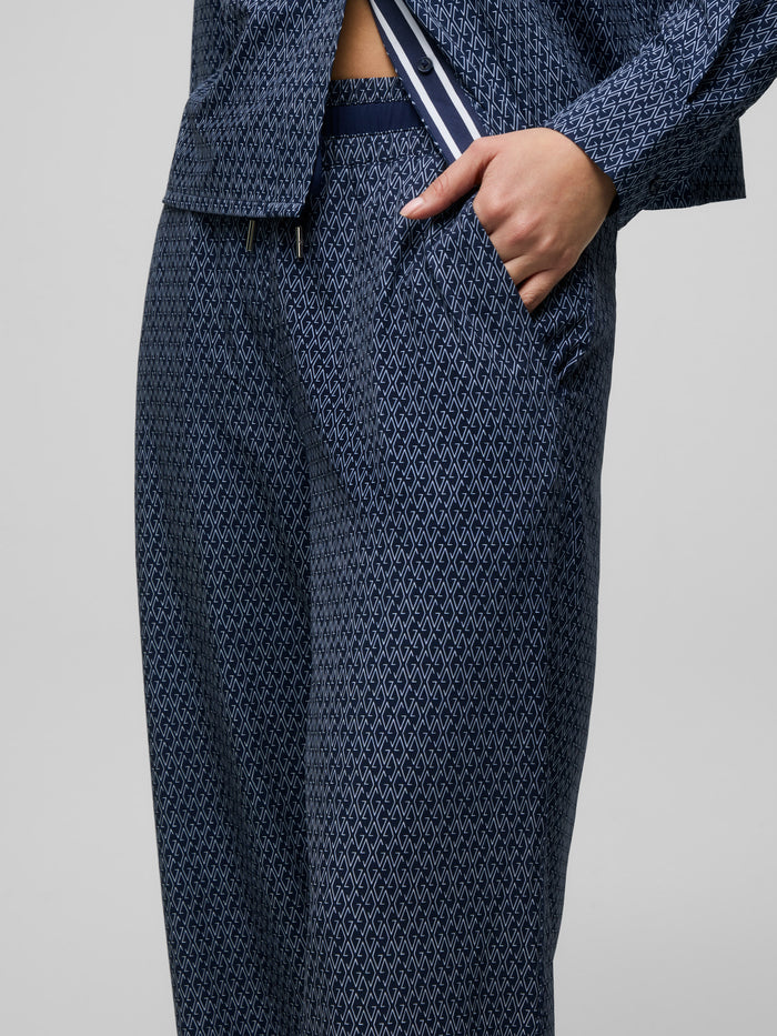 Maltese Blue G-Thing Ashe Wide-Leg Pant - Back View On Model, G-Monogram Fabric Print | Greyson Clothiers