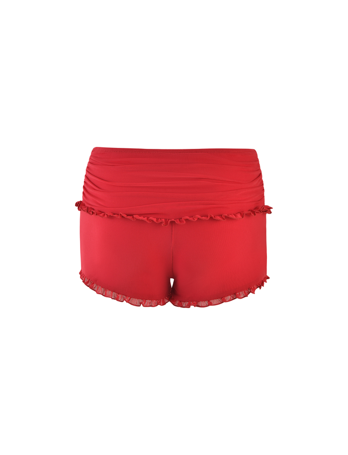 The TIGERMIST GINNY SHORT - RED in cherry red features ruffle details on the high waistband and leg openings, adding a playful touch to the classic bodycon style, shown against a plain white background.