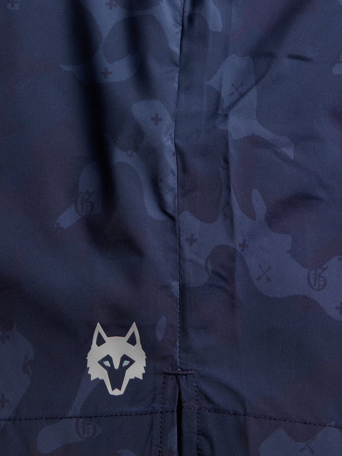 G.O.A.T. Camo Torch Swim Short - Signature Wolf Head Logo Close-Up on Maltese Blue Camo Fabric | Greyson Clothiers