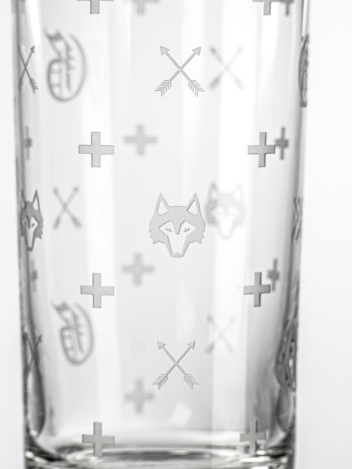 Greyson Clothiers G.O.A.T. Highball Glass - Etched Wolf Logo & Crossed Arrows Print Close-Up Detail | Greyson Clothiers