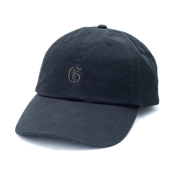 Greyson Gothic "G" Dad Hat in SHEPHERD Cotton Twill - Front Angle | Greyson Clothiers