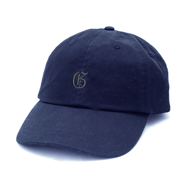 Greyson Gothic "G" Dad Hat in MALTESE Cotton Twill - Front Angle | Greyson Clothiers