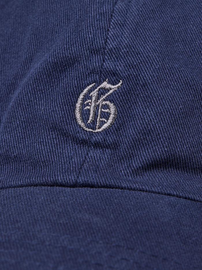 Maltese Gothic G Logo Embroidery Close-Up on Cotton Twill Dad Hat | Greyson Clothiers