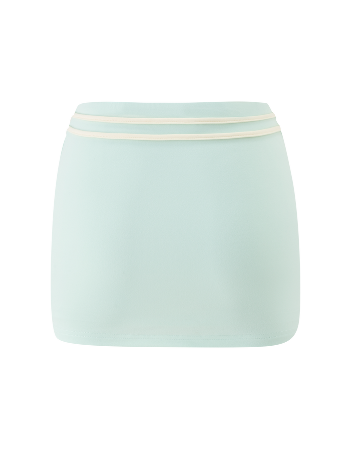 The TIGERMIST GREER MINI SKIRT in mint green features a fitted silhouette, pull-on style, and a white double stripe along the waistband, shown on a plain white background.
