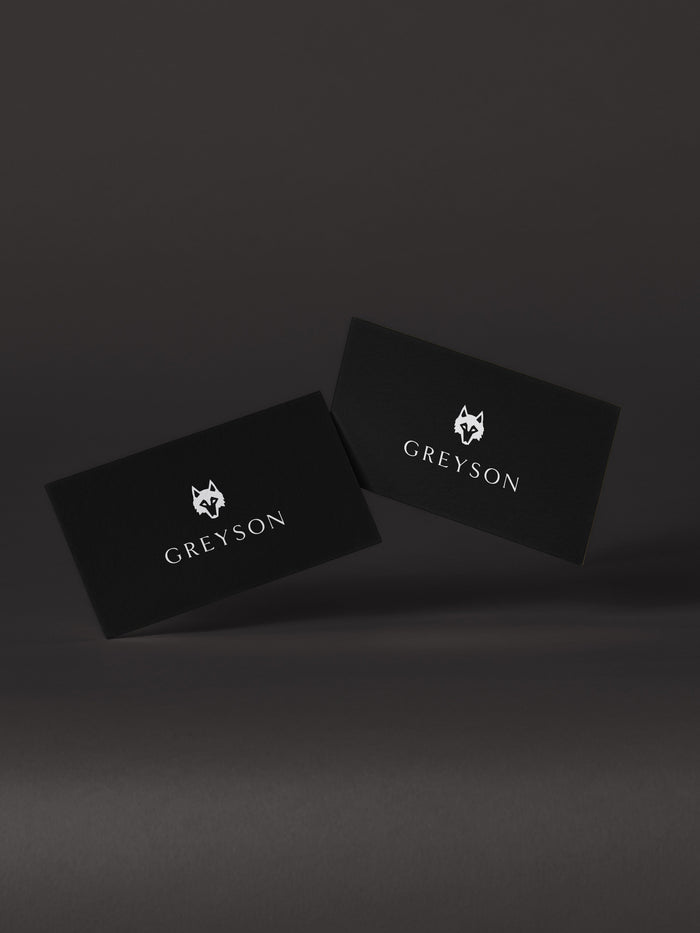 Greyson Clothiers E-Gift Card - Elevated Black Card Pair with Wolf Head Detail, Floating | Greyson Clothiers