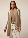 Tan Wool-Cashmere Knit Scarf with Wolf Logo - On-Model Front View, Greyson Wordmark Detail | Greyson Clothiers