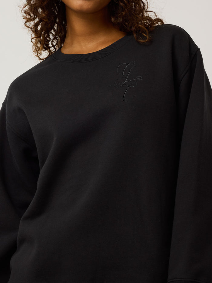Black Aspen Crewneck Sweatshirt - Close-Up Tonal GC Script Logo Embroidery Detail | Greyson Clothiers