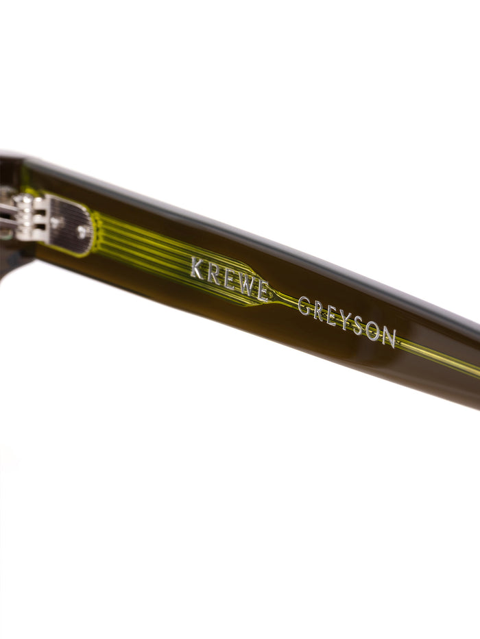 Greyson x Krewe Rory Sunglasses in Nori - Temple Arm Close-Up Showing Krewe x Greyson Co-Brand Logo | Greyson Clothiers