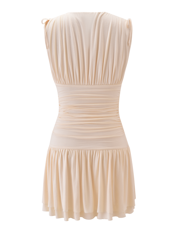 Back view of the TIGERMIST HALONA MINI DRESS in cream, featuring a sleeveless design, adjustable ruched waist with drawstring, and a tiered, flared mini skirt. Made from soft, lightweight fabric.