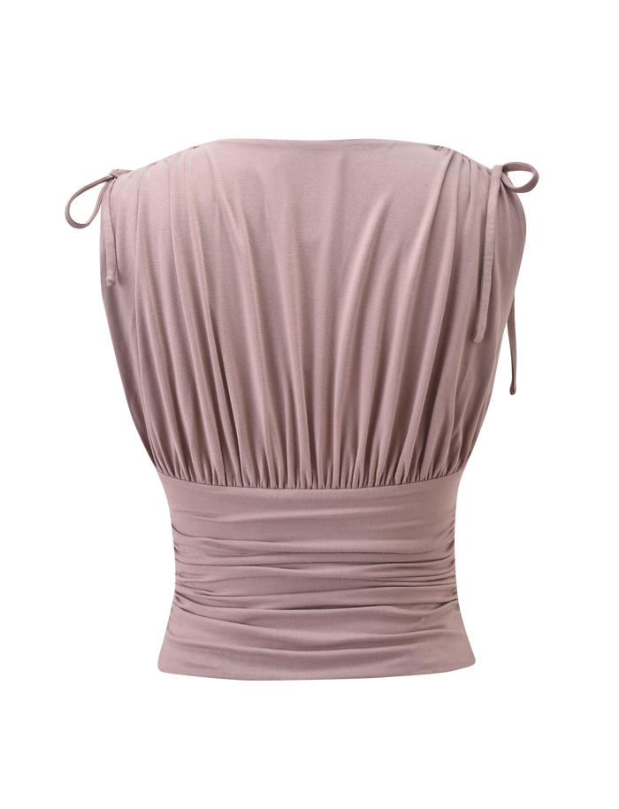 The HALONA TOP - MOCHA from TIGERMIST features a ruched bodice, gathered soft stretchy fabric, adjustable shoulder ties, a fitted waist, and a draped upper section.