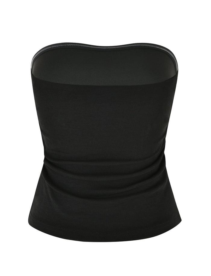The HARRIETT RIB TUBE TOP in black by TIGERMIST is a strapless bandeau with a bodycon silhouette, featuring a smooth, form-fitting design with a curved neckline and sleek finish.