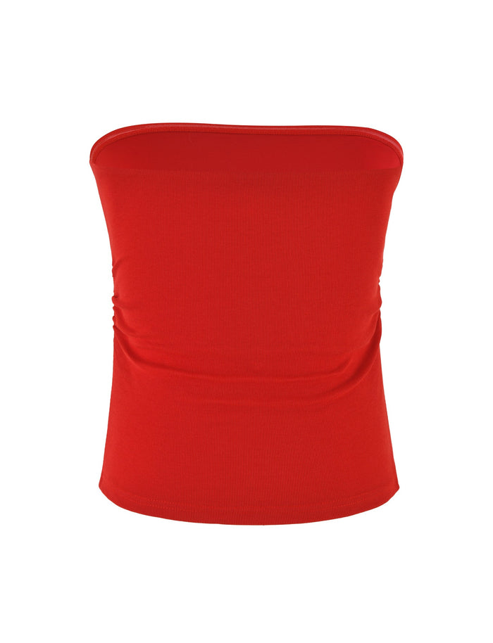 The HARRIETT RIB TUBE TOP by TIGERMIST is a red, bodycon strapless top featuring subtle side gathers and crafted from smooth, stretchy fabric. It showcases a straight neckline and hem for an effortlessly chic sleeveless look.