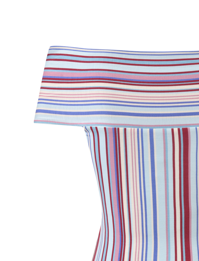 The TIGERMIST HAZE TWIST TOP features variegated blue, red, and white stripes with a fitted, off-the-shoulder twist design and a wide fold-over neckline.