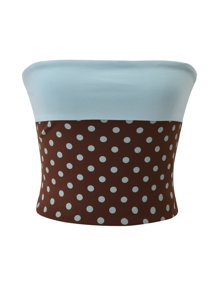 The TIGERMIST IMOGEN TUBE TOP - BROWN AND BLUE POLKA DOT is a strapless top with a light blue upper section and a brown lower section decorated with playful polka dots.