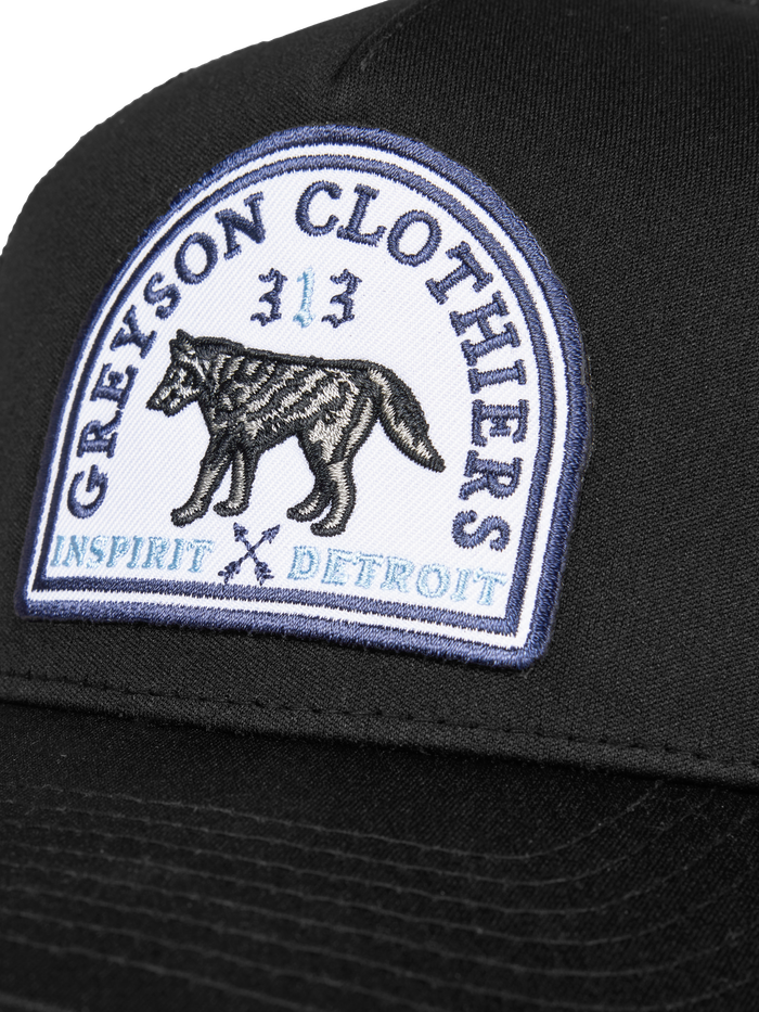 Shepherd Black Inspirit Wolf Trucker Hat - Embroidered Patch Detail | Greyson Clothiers