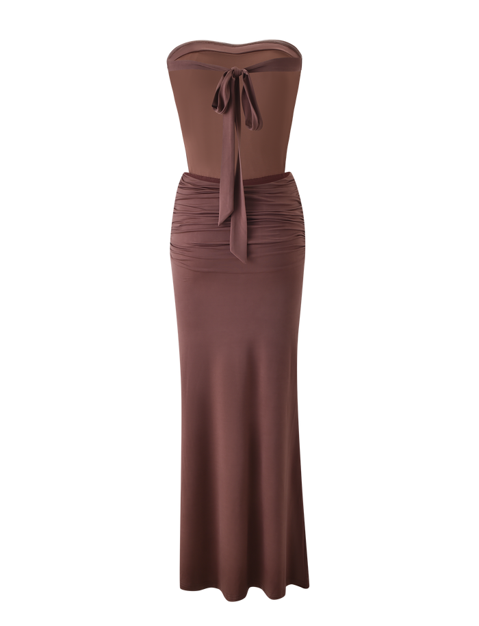 The IOLLA STRAPLESS MAXI DRESS - MOCHA by TIGERMIST features a strapless ruched bodice, fitted waist, and back bow tie detail in a rich mocha shade. Displayed against a plain white background.