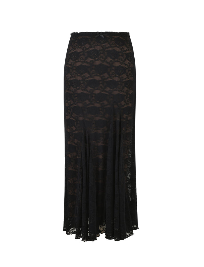 The TIGERMIST ISADORA SKIRT - BLACK : LACE is a sophisticated black lace midi skirt. It features a form-fitting design at the top that gracefully flares out at the bottom, showcasing a floral lace pattern for an elegant and delicate appearance. The skirt ends just below the knees.