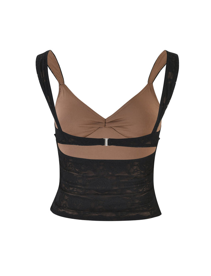 Introducing the TIGERMIST ISADORA TOP - BLACK : LACE, a stylish women's camisole featuring a light brown upper part and a sophisticated black lace overlay below the bust. This elegant garment includes adjustable shoulder straps and a decorative clasp centered at the front, designed to provide both comfort and style.