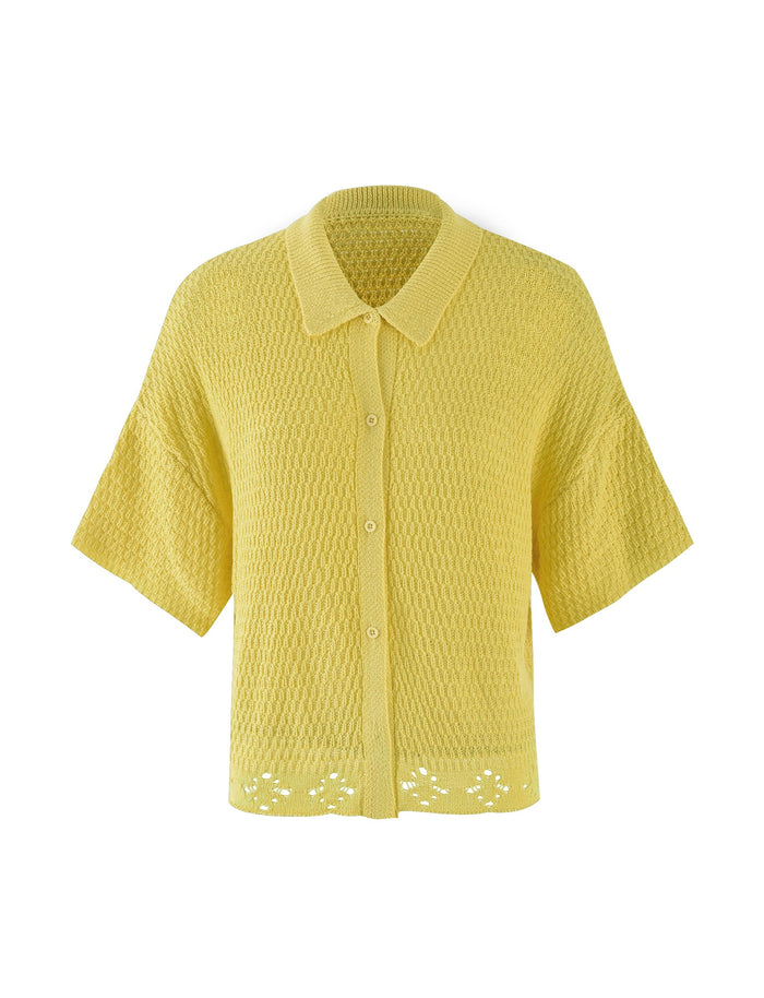 Introducing the JANAI TOP - YELLOW : LEMON from TIGERMIST, a short-sleeved, yellow knitted cardigan with a textured pattern. It features a collar, button-down front, and slightly cropped hem with a subtle open-knit detail. This stylish cardigan is displayed against a white background.