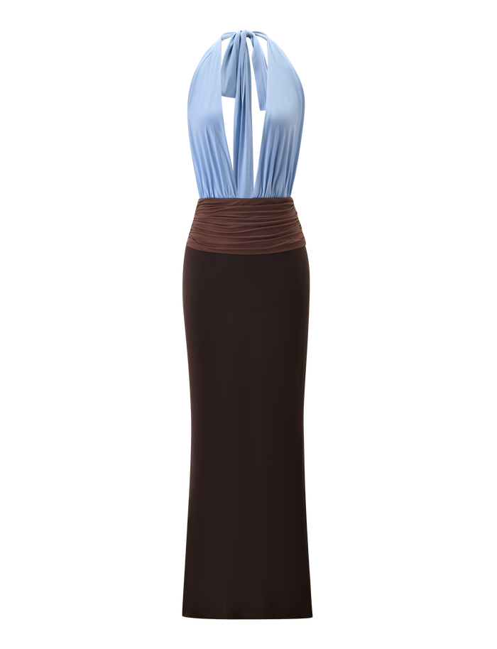 The JENNI PLUNGE MAXI DRESS by TIGERMIST features a sleeveless, colour-blocked halter-neck design with a light blue plunging bodice, ruched waistband, and a long dark brown skirt, shown against a white background.