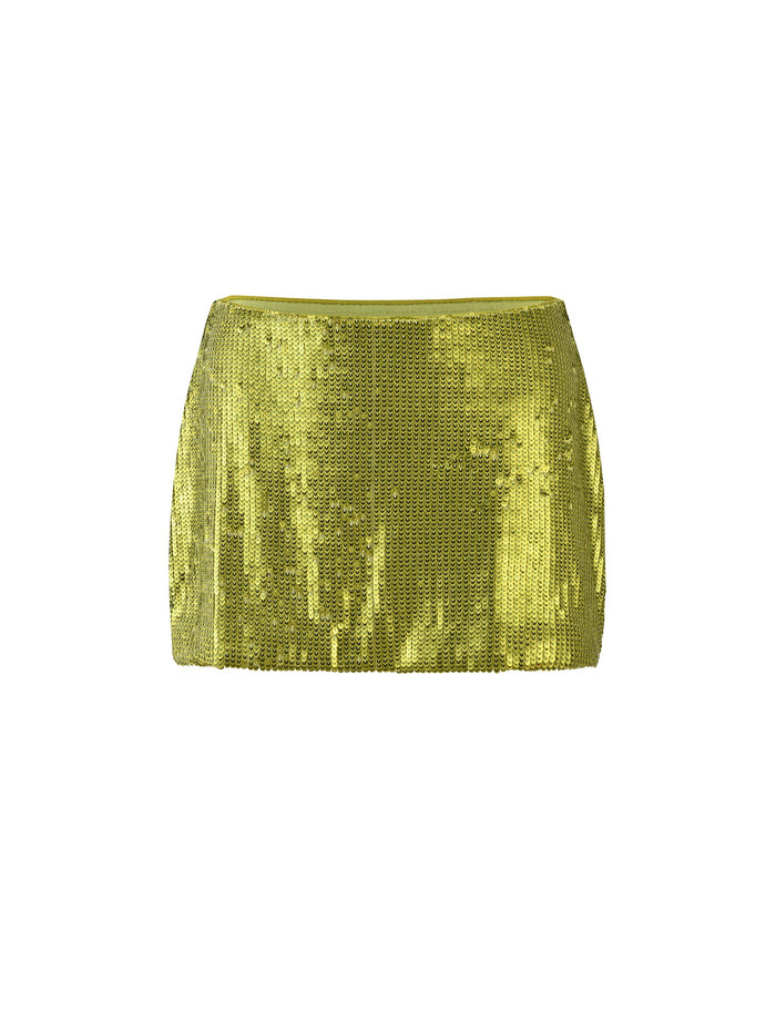 A green sequined mini skirt from TIGERMIST, featuring a shiny and reflective surface, is shown against a plain white background. The KAYE SKIRT - GREEN is fitted with a straight cut and appears above the knee in length.