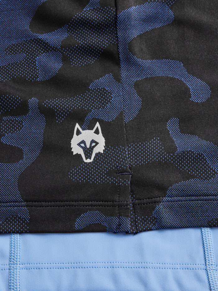 Kennebec Camo Short wolf logo and built-in liner close-up, Maltese Blue camo fabric texture with light blue liner | Greyson Clothiers