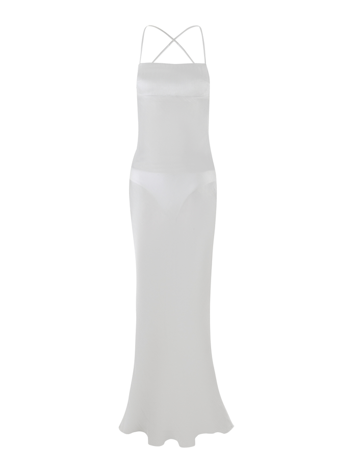 The KIAH MAXI DRESS - WHITE : ICE by TIGERMIST features thin criss-crossed straps, an open back, and a flared hem, showcased on a plain white background.
