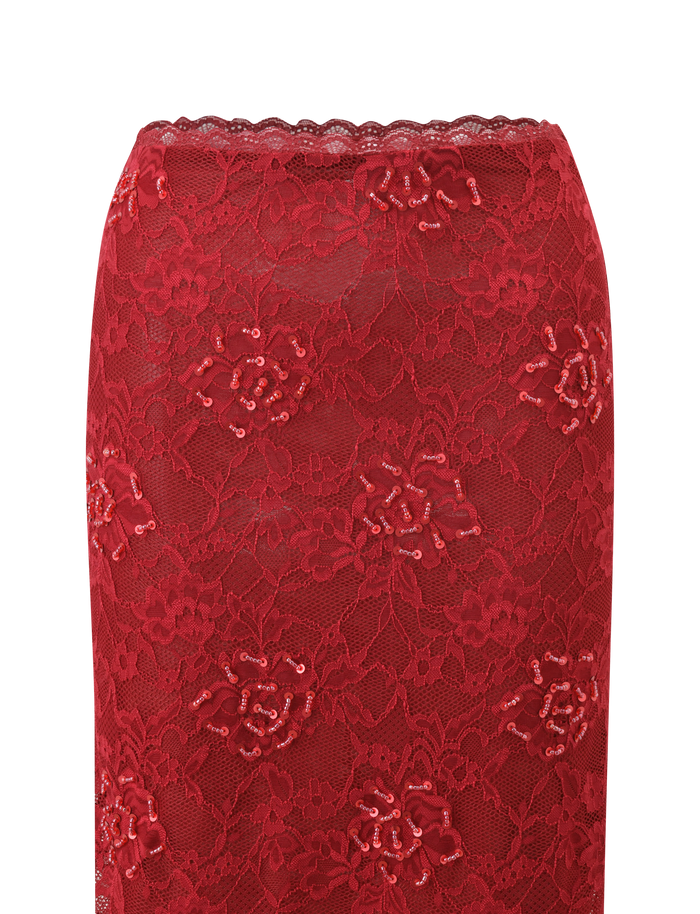 Close-up of the TIGERMIST KIRRA BEADED SEQUIN LACE MIDI SKIRT in red, featuring intricate floral patterns, small sequins, and a scalloped top edge, displayed on a white background.