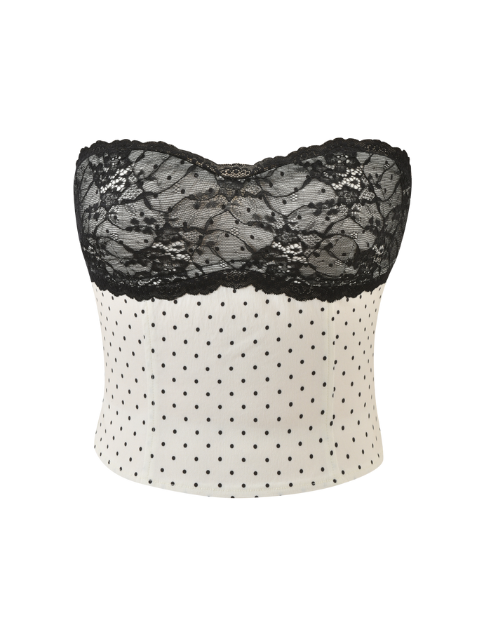 The TIGERMIST KITTIE LACE CORSET - CREAM DOT features a strapless design with a black floral lace overlay and a white lower half adorned with polka dots, plus scalloped edges for an elegant finish.