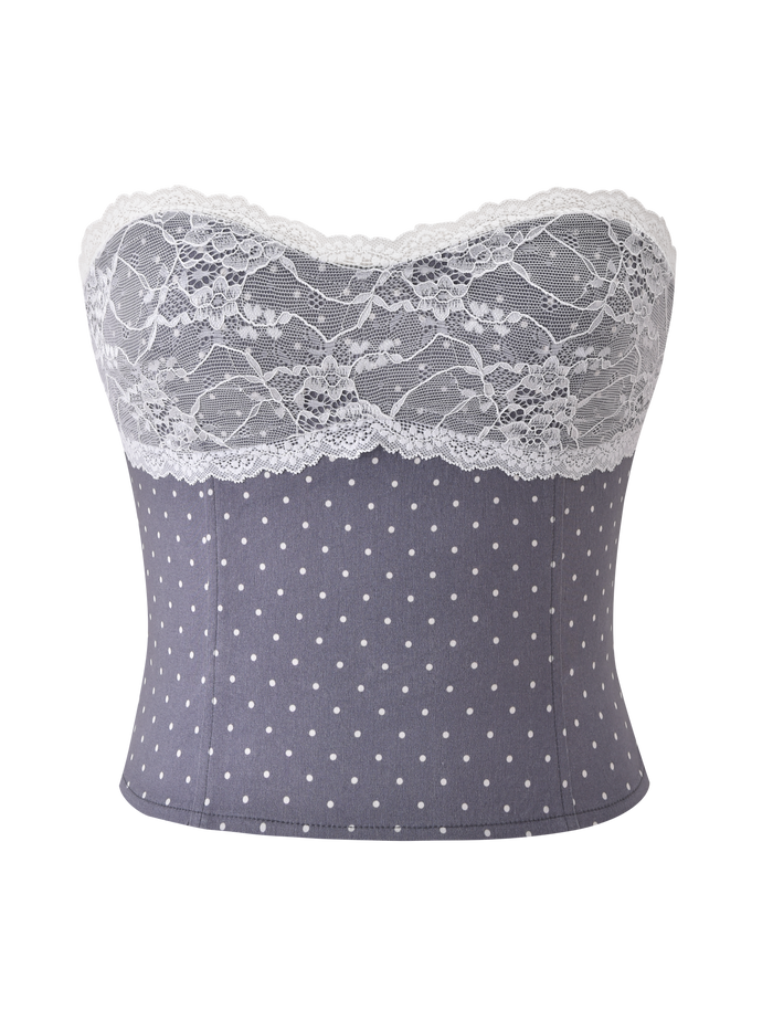 The TIGERMIST KITTIE LACE CORSET - GREY DOT is a strapless corset with a gray polka dot base, white floral lace band across the top, and a subtle sweetheart neckline for extra charm.