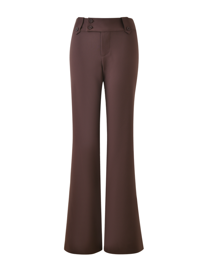 The KITTIE PANT - BROWN : CHOCOLATE by TIGERMIST showcases a high-waisted, flare fit with an asymmetrical waistband and front button details, shown against a plain background.