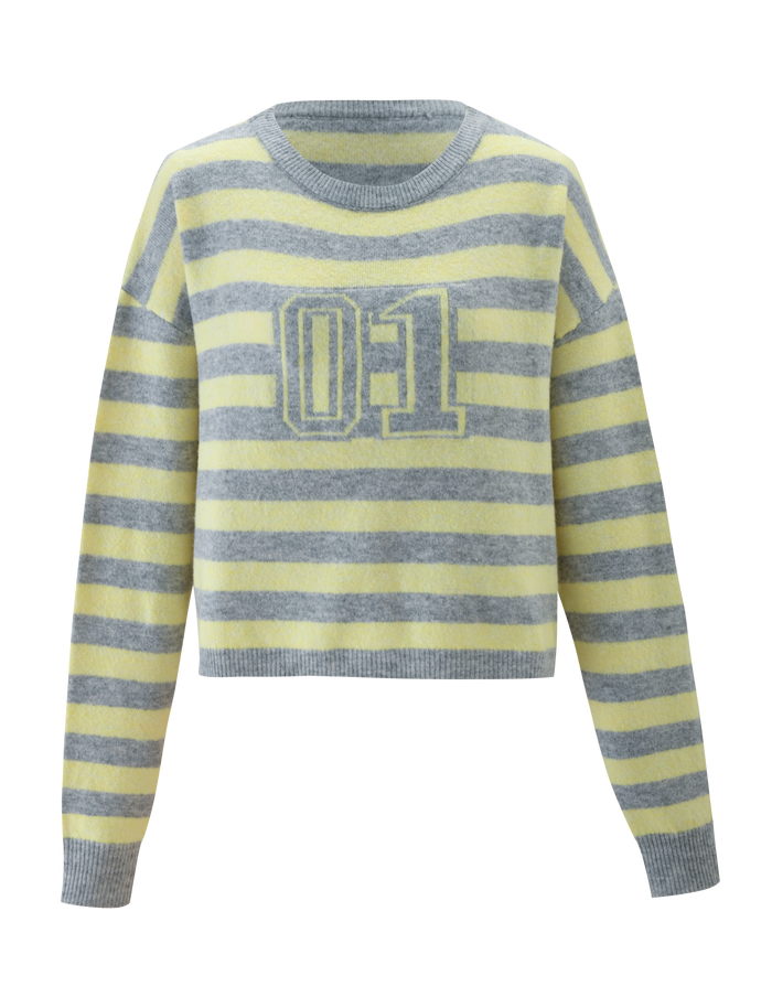The KOA JUMPER by TIGERMIST is an oversized, long-sleeve knit sweater with yellow and grey stripes, a sporty "01" chest print, and gray ribbed cuffs, neckline, and hem.