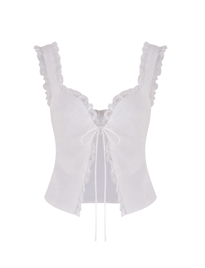 The KYANA TOP - WHITE by TIGERMIST is a white broderie crop top featuring ruffled straps, lace trim, eyelet fabric, a front tie closure, sweetheart neckline, and fitted silhouette for a chic look.