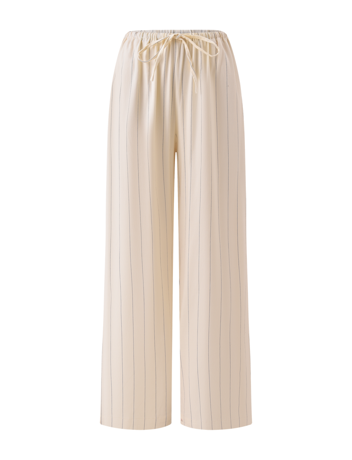 The TIGERMIST LAINEY PANT – BEIGE STRIPE features wide-leg, beige pinstripe linen with an elastic drawstring waistband, shown against a white background.