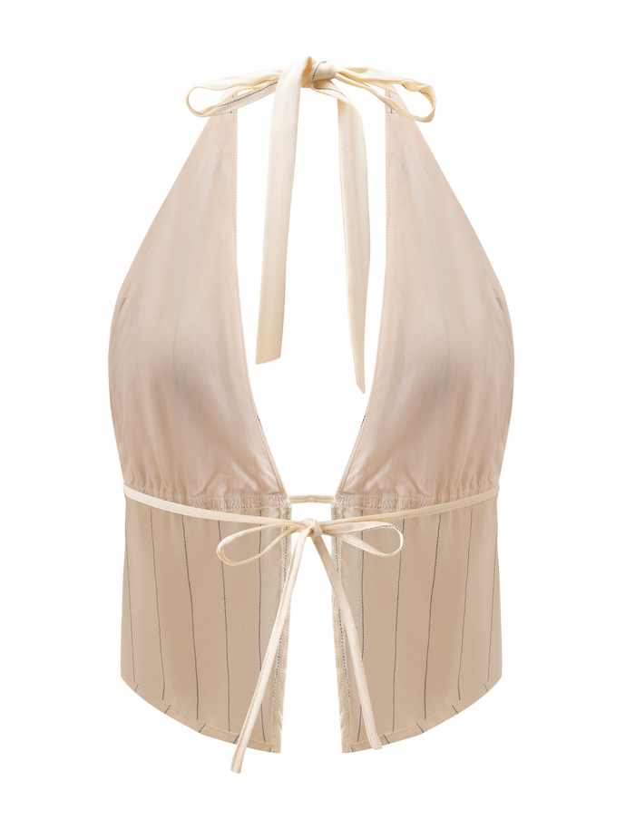 The LAINEY TOP - BEIGE STRIPE by TIGERMIST features thin vertical stripes, a deep V neckline, and adjustable halter ties at the neck and lower back. The linen fabric has a slight sheen with a soft, smooth finish.