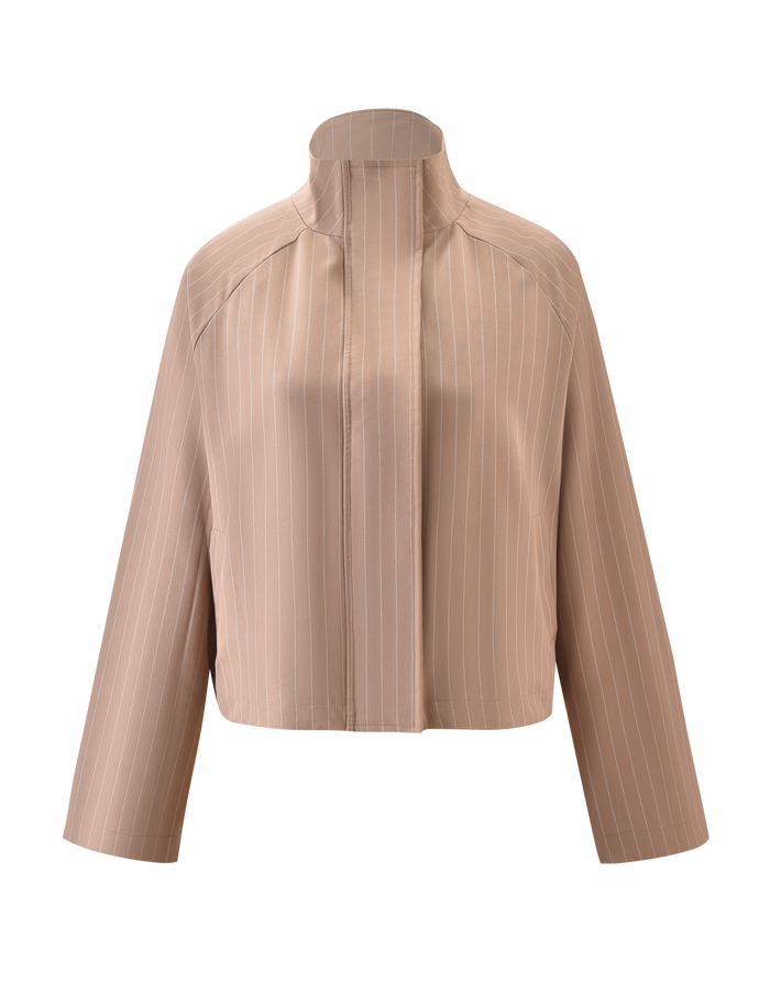 The TIGERMIST LENNEX JACKET - TAN PINSTRIPE is an oversized beige jacket with thin white stripes, long sleeves, a mock neck collar, and bungee drawstring hem, shown on a plain white background.