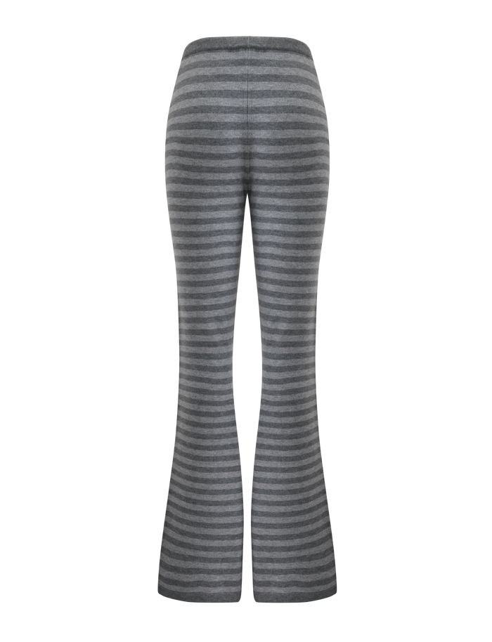 The LEORA PANT - GREY STRIPE by TIGERMIST features gray and dark gray horizontal stripes, a flared leg, and an elastic waistband—shown from the back on a white background. These stylish knit pants are ideal for comfortable, everyday wear.